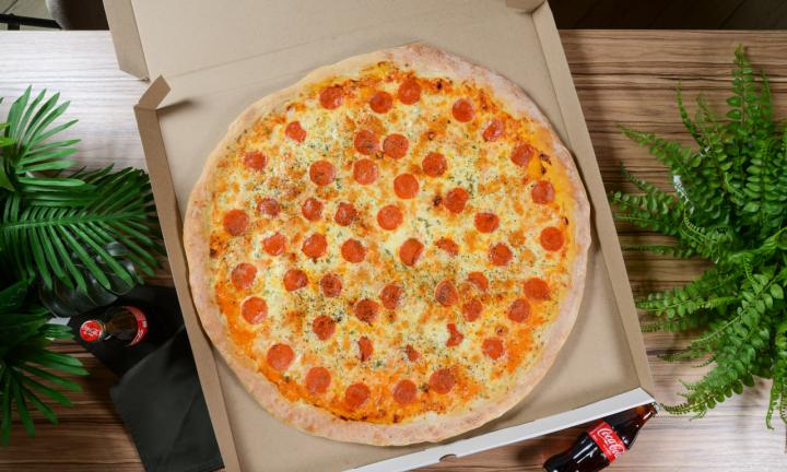 Гигантская пицца и четыре литра капучино. Чем удивляют омские рестораны
